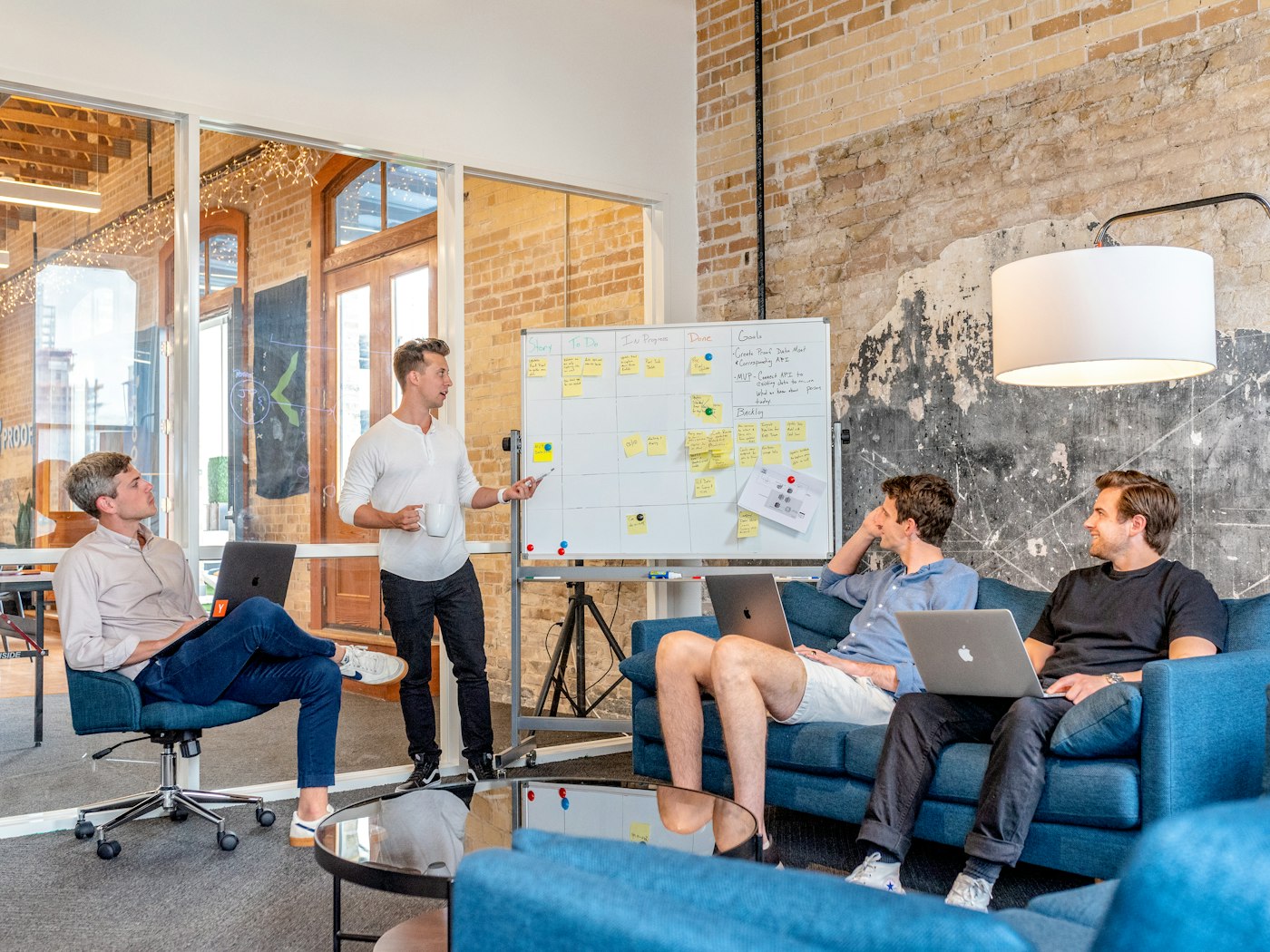 Leaders mapping a data strategy roadmap on a wall of planning notes